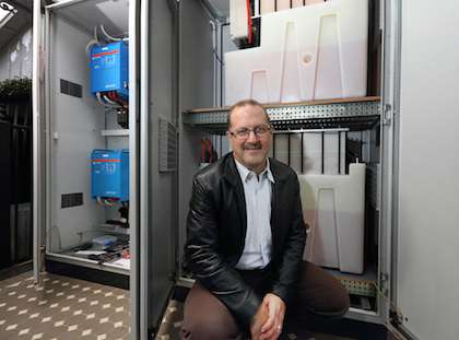 Simon Hackett with his Redflow home energy storage system